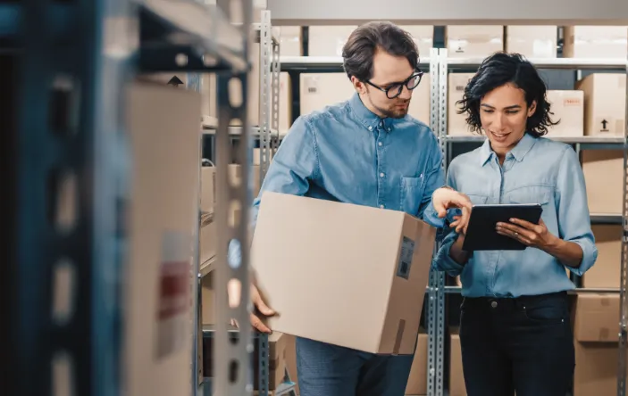 warehouse workers using tablet